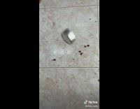 Guy drops his stuff after rubbing feet together 