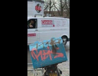 Lady in red outside beat blue mailbox 