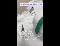 Snowman wearing red hat and green tie 