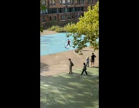 Man twirl and rolling inside a big circle at the park