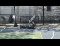 Guy does sit ups with metal barrier