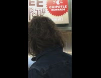 Man at Chipotle has long scruffy hair just like his dog
