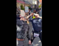 Marathon runner drinks with guy on shotgun