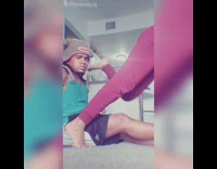 Pink pants girl feet on shoulders guy