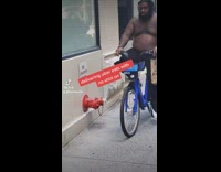 Guy delivers food shirtless on bike 