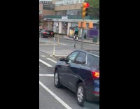 Collab WINY - Guy green backpack ride tall unicycle on street