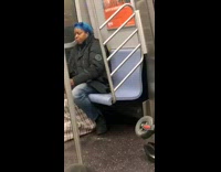 Black jacket lady smokes subway train scooter