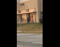 Two men employee tiktok dance outside work