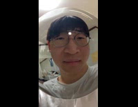 Man on Fisheye Camera Filter Makes Faces