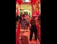 Girl taking pictures red Chinese lanterns