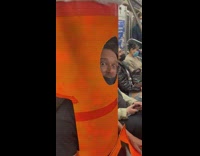 Kid break dancing on train and giant crayon watches