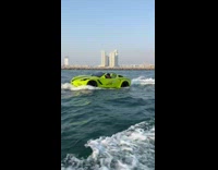 Guy drive car shaped boat in ocean