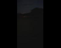 Man holds firework in mouth and sparks hit face