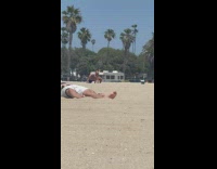 Collab IITW - Man and Woman in beach attire dramatic dance at the beach