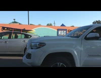 Collab Kook Of The Day - Guy shows how to not tie a surfboard to roof, gray prius ties red rope through window