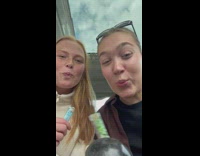 Two women eating jelly then one woman chokes and booger comes out