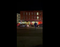 Car crash leaves red car on top of the other