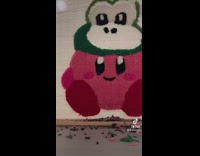 Time Lapse of guy making kirby yoshi rug 