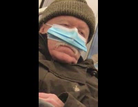 Grandpa with face mask only covering nose 