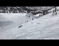 guy in red failed back flip ski