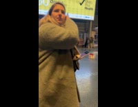 Two guys robot dance at ferry terminal