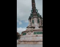 Guy white long sleeves suit statue monument