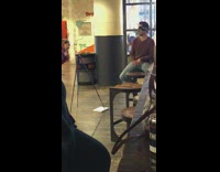 guy black blind fold red shirt