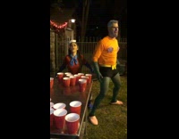 Couple beer pong dances and sings spongebob song