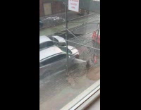 Broken fire hydrant splash water on car