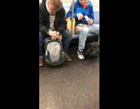 man makes peanut butter jelly sandwich on subway