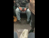 Used wet condom on the floor on subway train