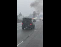 Car burns with huge fire on road