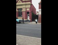 Girl black jacket stand blue car street