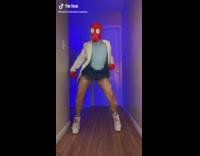 Woman dressed as zoidberg doing a dance to a song