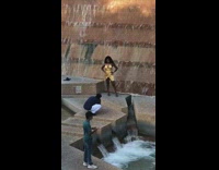 Gold dress girl brown water fountain 