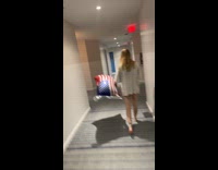 Drunk guy passed out in hotel hallway