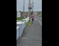 Man runs in front of speed radar that says 50 mph