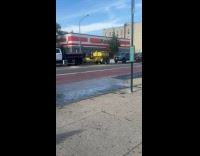 Man help free car wash from fire hydrant