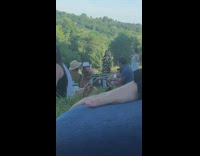 Black yellow dress girl spins grass picnic 