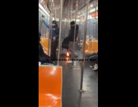 Scooter on fire inside the subway train