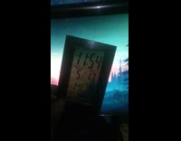 Digital clock reveals time when tilted