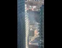 Strong water streams out from the building