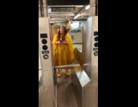Couple dressed as metrocard king and queen