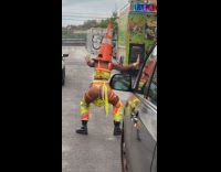 Collab WINY - Woman in construction suit and traffic cone on head 