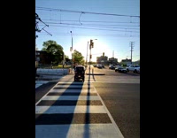 Man amused seeing enclosed mobility scooter