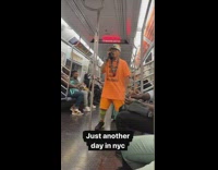 Man sings and dances inside the subway train