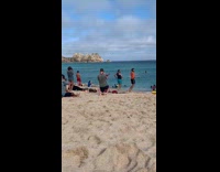 Three people long embarrassing dance jump beach