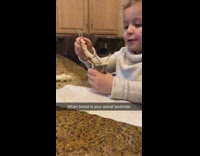 Little girl says bread is me kitchen 