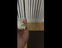 Lightbulb lights up when bottom part touched by palm