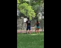 Guy girl lift kettle bells park tripod 